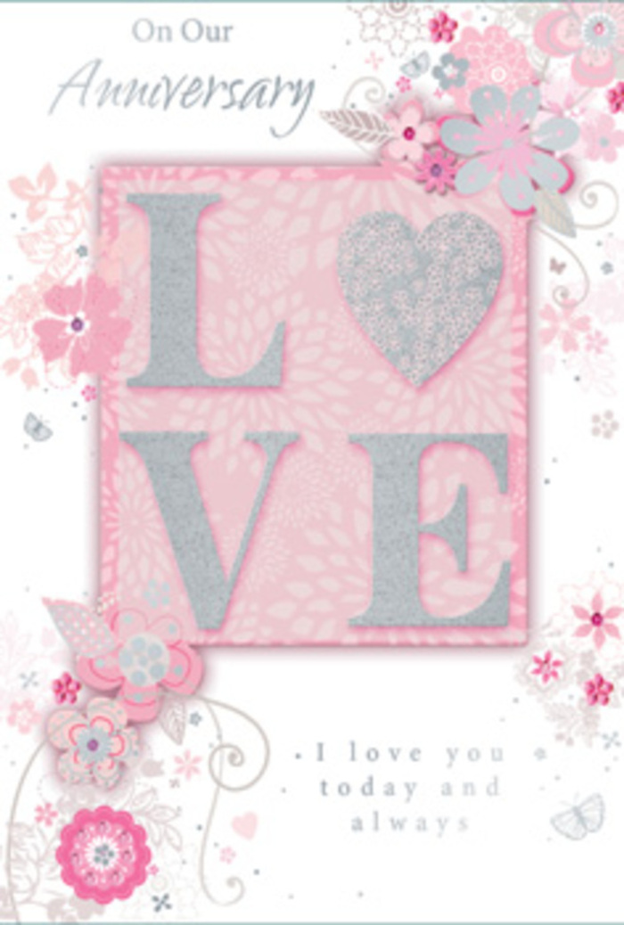 Opened flat on a tabletop, this anniversary card looks as if it's waiting to be tucked beside a bouquet ordered for same-day delivery across Barkingside, perhaps to a home near Gants Hill or a quiet flat just off Cranbrook Road. The centrepiece of the design is the word LOVE, stretched across the card in large, raised letters that feel velvety to the touch, edged with a frosted glitter that catches and scatters light. As your fingers glide over the surface, the change from the smooth cardstock to the slightly rough, sparkling texture is unmistakable, something you can almost sense without seeing. The colour story is tender and harmonious: the backdrop is a soft pink reminiscent of the inside of a rose petal, melting into subtle ivory and pearly white tones, with slivers of silver that glint like polished jewellery worn for a special dinner. Around this central motif, artists' lines unfurl into wispy, hand-drawn blooms and sprays of foliage. The flowers are not heavily detailed but rather sketched with elegance, suggesting petals drifting gently, as though they've floated onto the page from a bouquet prepared by an experienced local florist. Shades of blush, lilac, and ivory intermingle in the illustrations, providing depth and a sense of movement that keeps the eye traveling from corner to corner. Delicate flourishes-filigree curls, tiny leaves, and the faint suggestion of butterflies-add a feeling of soft flutter, as if hearts are quietly beating in unison. Nestled within the design, the message I love you today and always, or a similarly tender sentiment, is printed in an understated, classic typeface that complements the floral artwork rather than competes with it. Overall, the card feels like a paper bouquet: a carefully crafted, gently radiant gesture of love meant to accompany a beautiful arrangement arriving at a Barkingside doorstep.