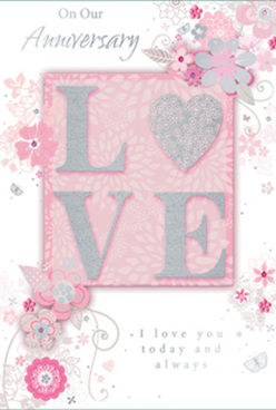 An air of quiet sophistication surrounds this anniversary card, which could easily accompany a romantic delivery arranged by Flower Delivery Barkingside for couples celebrating along Fencepiece Road or in the side streets off Fullwell Cross. The focal point is the word "LOVE," rendered in textured, slightly raised letters whose edges are kissed with delicate glitter. This glimmer is not brash, but refined, catching light in a way that mimics the soft sparkle of morning dew on petals in a Barkingside garden. Behind the word, a blush-pink background glows gently, like soft lamplight through a curtain, gradually fading toward creamy whites and cool grey notes that lend balance and poise. Encircling the central motif is a cascade of illustrated flowers and trailing vines, arranged in a loose, circular sweep that feels both intentional and free. Each tiny blossom, outlined with fine line work and accented here and there with subtle hints of silver foil, suggests the patient, careful work a florist undertakes when shaping a romantic bouquet for an anniversary. The flowers are stylised yet expressive, with petals and leaves flowing outward as though caught in a tender breeze. Within and around this floral dance, tasteful scripted text expresses heartfelt wishes for continued affection and shared memories. The script is smooth and timeless, the spacing generous, making the card feel calm and uncluttered. Together, the pearly colour palette, the shimmering details, and the floral artistry combine to create a keepsake that evokes treasured moments and enduring connection, like a fragrance that gently lingers after the celebration has ended.